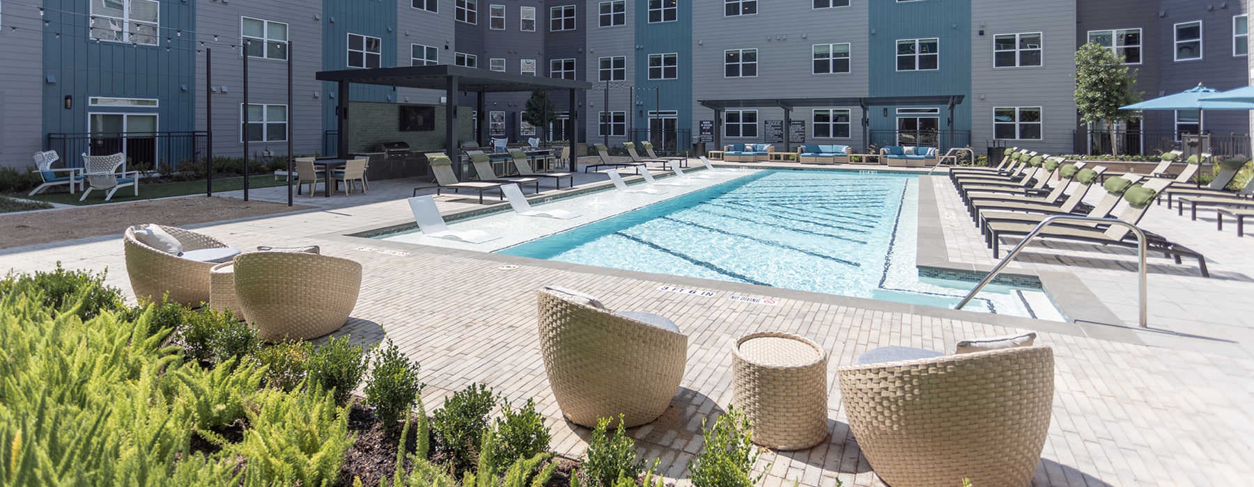 wicker furniture to relax poolside